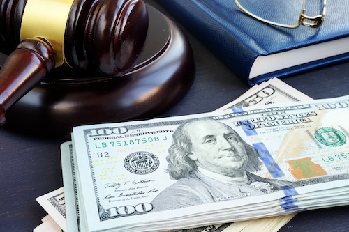 Judge's gavel and bail money from bail bonds.
