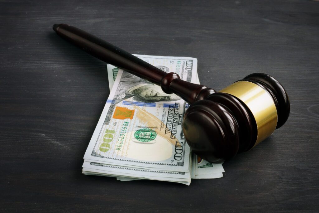 Gavel and money for Bail Bonds - Air Capital Bail Bonds