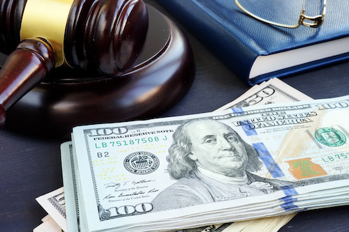 Judge's gavel and bail money from bail bonds.