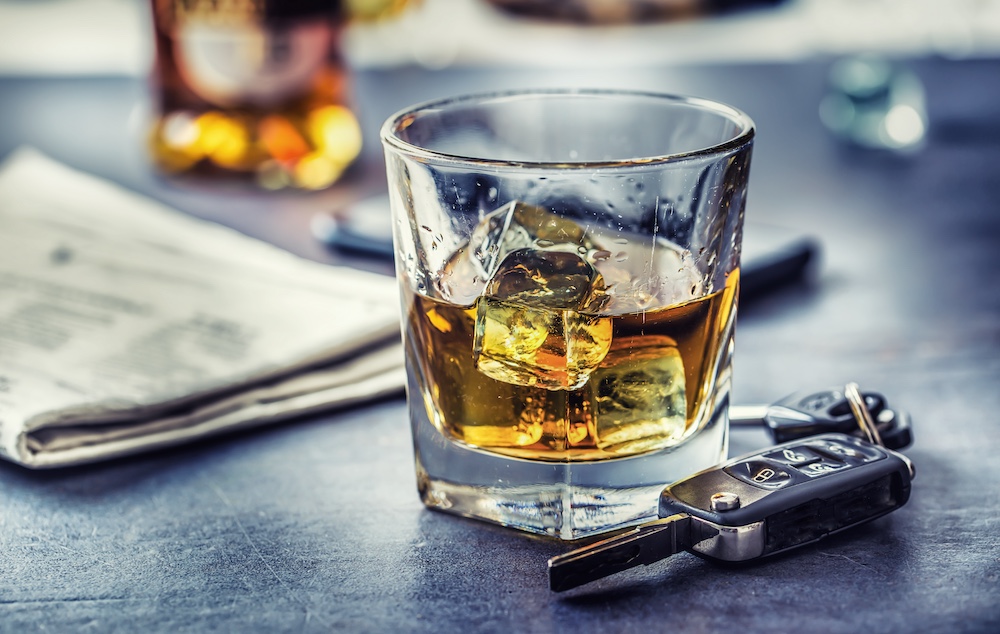 Car keys and glass of alcohol on table - DUI Prevention Plan - Air Capital Bail Bonds in Wichita, Kansas